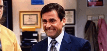Michael Scott from The Office cringing