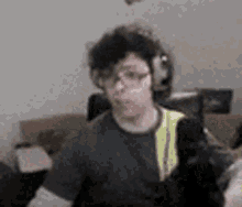 A guy holding the mic up to the camera