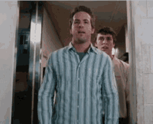 Young Ryan Reynolds shivering uncomfortably