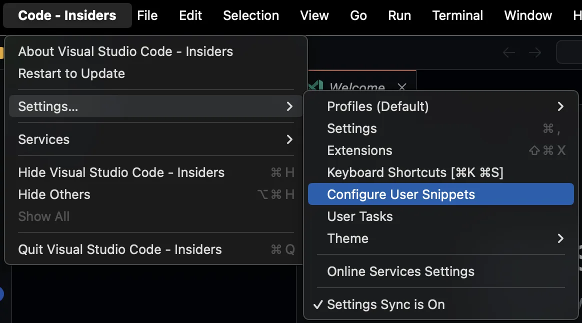 Screenshot of the Code menu open with Settings selected, and the settings menu open beside it with Configure User Snippets highlighted